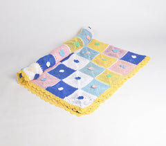 Crochet Throw with floral accents Crochet Throw with floral accents
