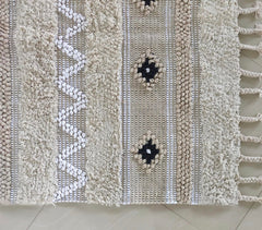 Textured Rug with Panels & Braided Tassels