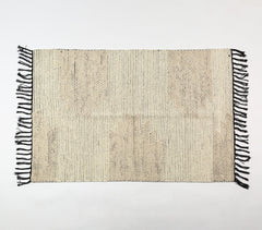 Tufted & Tasseled Neutral rug