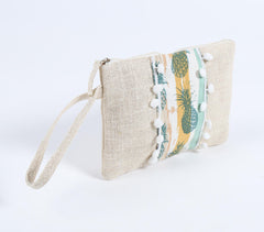 Pompom-lined Tropical Jute Wristlet